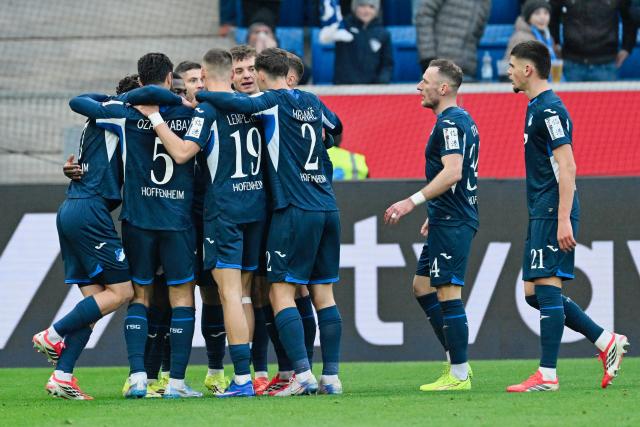 31 January 2026, Baden-Württemberg, Sinsheim: Hoffenheim's Andrej Kramaric celebrates scoring his side's first goal with teammates during the German Bundesliga soccer match between TSG 1899 Hoffenheim and 1. FC Union Berlin at the PreZero Arena. Photo: Uwe Anspach/dpa - IMPORTANT NOTICE: DFL and DFB regulations prohibit any use of photographs as image sequences and/or quasi-video.