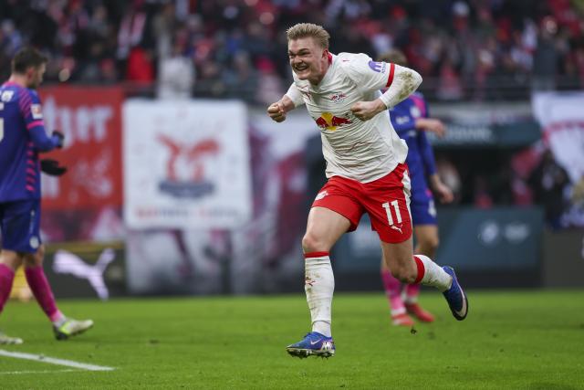 31 January 2026, Saxony, Leipzig: Leipzig's Conrad Harder celebrates scoring his side's first goal during the German Bundesliga soccer match between RB Leipzig and FSV Mainz 05 at the Red Bull Arena. Photo: Jan Woitas/dpa - IMPORTANT NOTICE: DFL and DFB regulations prohibit any use of photographs as image sequences and/or quasi-video.