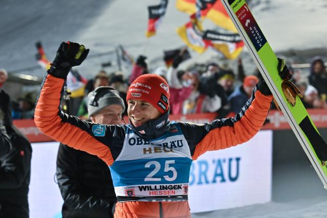 30 January 2026, Hesse, Willingen: Germany's second-placed Karl Geiger celebrates after the men's Large Hill competition of the FIS Ski Jumping World Cup FIS Ski Jumping World Cup in Willingen. Photo: Swen Pförtner/dpa