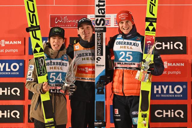 30 January 2026, Hesse, Willingen: Japan's third-placed Ren Nikaido, Slovenia's winner Domen Prevc and Germany's second-placed Karl Geiger celebrate on the podium after the men's Large Hill competition of the FIS Ski Jumping World Cup FIS Ski Jumping World Cup in Willingen. Photo: Swen Pförtner/dpa