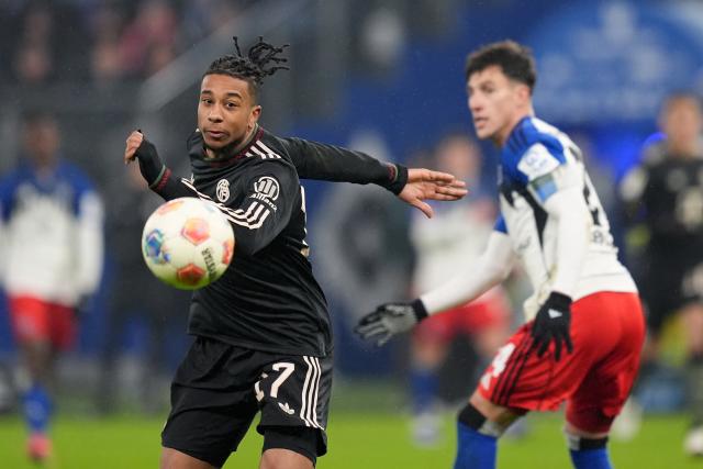 31 January 2026, Hamburg: Bayern Munich's Michael Olise eyes the ball during the German Bundesliga soccer match between Hamburger SV and FC Bayern Munich at the Volksparkstadion Photo: Marcus Brandt/dpa - IMPORTANT NOTICE: DFL and DFB regulations prohibit any use of photographs as image sequences and/or quasi-video.