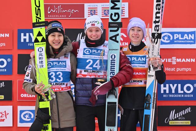 01 February 2026, Hesse, Willingen: (L-R) Japan's runner-up Nozomi Maruyama, Norway's winner Eirin Maria Kvandal and Slovenia's third-placed Nika Prevc celebrate on the podium after the women's Large Hill competition of the FIS Ski Jumping World Cup in Willingen. Photo: Swen Pförtner/dpa