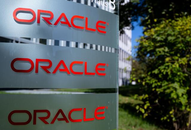 FILED - 25 September 2023, Bavaria, Munich: The logo of the software and hardware manufacturer Oracle can be seen at the German headquarters. Photo: Sven Hoppe/dpa