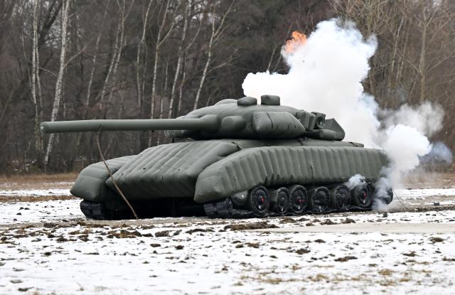 02 February 2026, Bavaria, Erding: A drone attacks a dummy tank as a demonstration during the opening of the Bundeswehr Innovation Center. The innovation center is to become the interface between start-ups, the civilian research and industrial landscape and the Bundeswehr. Photo: Sven Hoppe/dpa