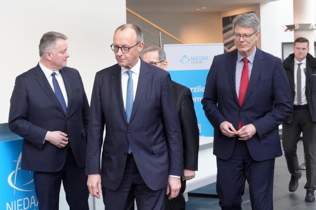 02 February 2026, Neustadt (Wied): (L-r) Christian Democratic Union of Germany (CDU) state chairman for Rhineland-Palatinate Gordon Schnieder, German Chancellor Friedrich Merz and Minister of Transport Patrick Schnieder attend the opening of the Niedax Technology Campus. Photo: Thomas Frey/dpa