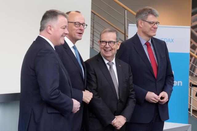 02 February 2026, Neustadt (Wied): (L-r) Christian Democratic Union of Germany (CDU) state chairman for Rhineland-Palatinate Gordon Schnieder, German Chancellor Friedrich Merz, CEO of Niedax Bruno Reufels and Minister of Transport Patrick Schnieder attend the opening of the Niedax Technology Campus. Photo: Thomas Frey/dpa