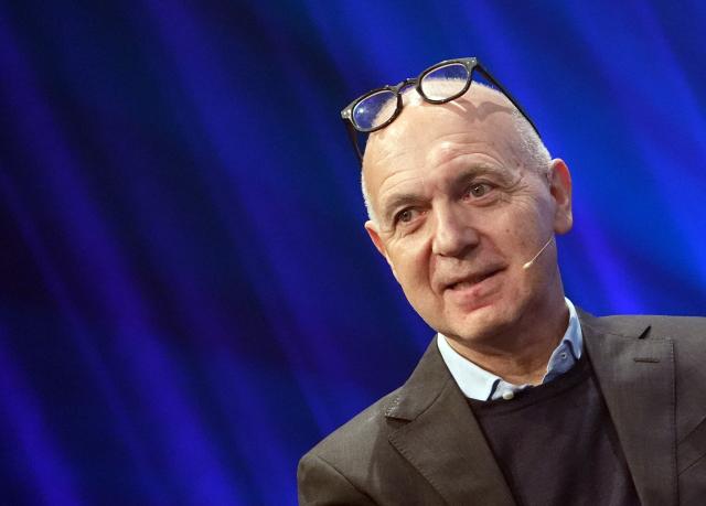 04 February 2026, Hamburg: Bernd Neuendorf, President of the German Football Association (DFB), sits on the stage during the: Spobis sports business conference at the CCH Congress Center Hamburg. Photo: Marcus Brandt/dpa