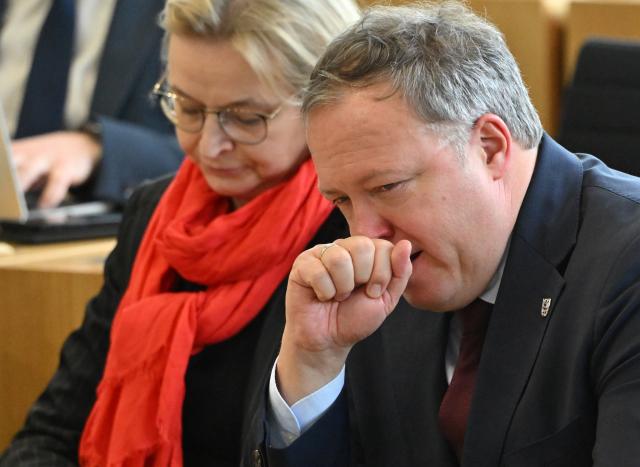 04 February 2026, Thuringia, Erfurt: Minister President of Thuringia Mario Voigt (L) and Minister of Finance and Deputy Minister President of Thuringia Katja Wolf attend the Thuringian state parliament. On the agenda for the day is a vote of no confidence in the Minister President by the AfD parliamentary group. Photo: Martin Schutt/dpa