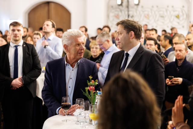 04 February 2026, Bavaria, Munich: Mayor of Munich Dieter Reiter (L) talks with German Minister of Finance Lars Klingbeil at a reception for new German citizens in Munich's Old Town Hall. Photo: Matthias Balk/dpa