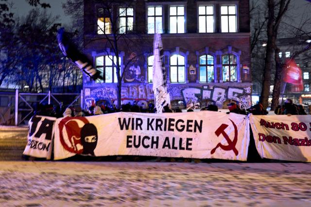 04 February 2026, Berlin: Demonstrators hold a banner reading "We'll get you all" on their way to Frankfurter Tor. The Budapest City Court has sentenced the non-binary German person Maja T. to eight years in prison. Photo: Michael Ukas/dpa
