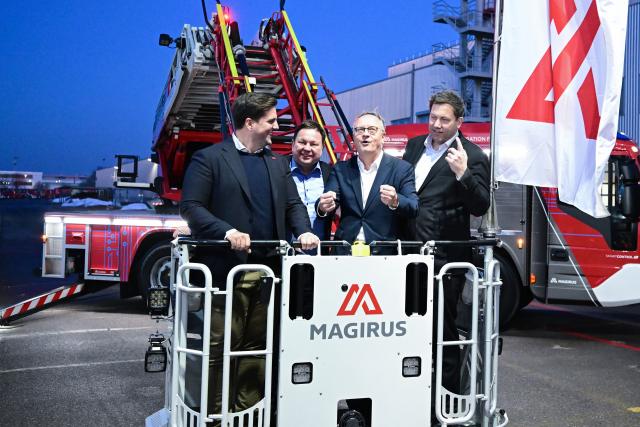 05 February 2026, Baden-Wuerttemberg, Ulm: (L-R) CEO of Magirus Fatmir Veselaj, Social Democratic Party of Germany (SPD) member of the German Bundestag Martin Gerstner, SPD parliamentary group leader in the Baden-Wuerttemberg state parliament Andreas Stoch and chairman of the SPD Lars Klingbeil stand in the basket of a Magirus fire department turntable ladder as it rises during Lars Klingbeil's visit to Magirus. Photo: Bernd Weißbrod/dpa