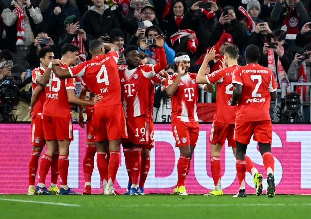 08 February 2026, Bavaria, Munich: Bayern Munich's celebrate their side's first goal scored by Harry Kane during the German Bundesliga soccer match between Bayern Munich and TSG 1899 Hoffenheim at the Allianz Arena. Photo: Sven Hoppe/dpa - IMPORTANT NOTE: In accordance with the regulations of the DFL German Football League and the DFB German Football Association, it is prohibited to utilize or have utilized photographs taken in the stadium and/or of the match in the form of sequential images and/or video-like photo series.