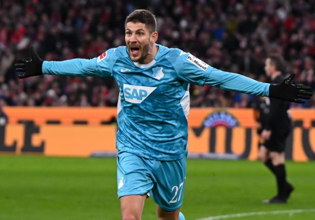 08 February 2026, Bavaria, Munich: Hoffenheim's Andrej Kramaric celebrates scoring his side's first goal during the German Bundesliga soccer match between Bayern Munich and TSG 1899 Hoffenheim at the Allianz Arena. Photo: Sven Hoppe/dpa - IMPORTANT NOTE: In accordance with the regulations of the DFL German Football League and the DFB German Football Association, it is prohibited to utilize or have utilized photographs taken in the stadium and/or of the match in the form of sequential images and/or video-like photo series.