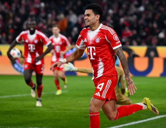 08 February 2026, Bavaria, Munich: Bayern Munich's Luis Diaz celebrates scoring his side's fourth goal during the German Bundesliga soccer match between Bayern Munich and TSG 1899 Hoffenheim at the Allianz Arena. Photo: Sven Hoppe/dpa - IMPORTANT NOTE: In accordance with the regulations of the DFL German Football League and the DFB German Football Association, it is prohibited to utilize or have utilized photographs taken in the stadium and/or of the match in the form of sequential images and/or video-like photo series.