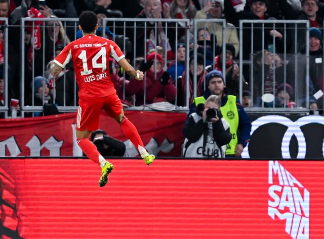 08 February 2026, Bavaria, Munich: Bayern Munich's Luis Diaz celebrates scoring his side's third goal during the German Bundesliga soccer match between Bayern Munich and TSG 1899 Hoffenheim at the Allianz Arena. Photo: Sven Hoppe/dpa - IMPORTANT NOTE: In accordance with the regulations of the DFL German Football League and the DFB German Football Association, it is prohibited to utilize or have utilized photographs taken in the stadium and/or of the match in the form of sequential images and/or video-like photo series.