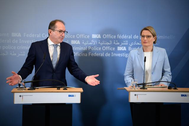 09 February 2026, Berlin: Alexander Dobrindt (L), German Minister of the Interior, and Stefanie Hubig, German Minister of Justice and Consumer Protection, speak at the start of their visit to the Joint Counter-Terrorism Center (GTAZ) on the premises of the German Criminal Police Office (BKA) in Berlin. The GTAZ is the central cooperation platform for combating international, religiously motivated terrorism. Photo: Bernd von Jutrczenka/dpa