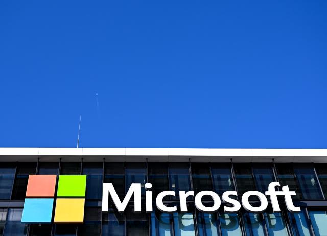 FILED - 30 January 2026, Bavaria, Munich: The Microsoft logo can be seen on the Microsoft Germany headquarters building in Munich. Photo: Sven Hoppe/dpa
