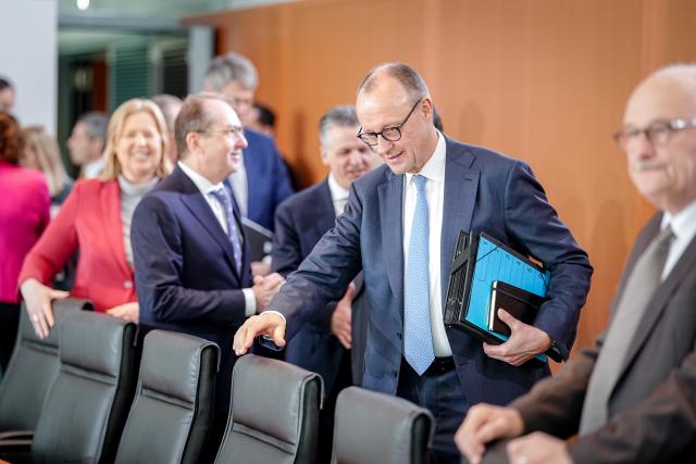 11 February 2026, Berlin: German Chancellor Friedrich Merz  joins Baerbel Bas, Federal Minister of Labor and Social Affairs and SPD party chairwoman, Alexander Dobrindt, Federal Minister of the Interior, and Thorsten Frei, Head of the Federal Chancellery and Federal Minister for Special Tasks, at the meeting of the Federal Cabinet in the Federal Chancellery. Photo: Kay Nietfeld/dpa
