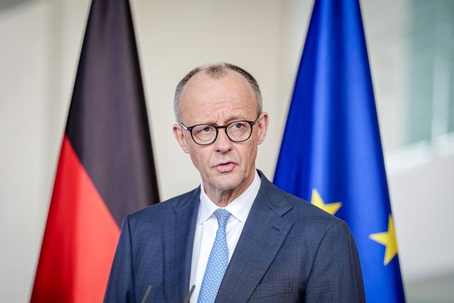 11 February 2026, Berlin: German Chancellor Friedrich Merz accepts the report of the Commission of Experts for Research and Innovation (EFI). The Commission advises the Federal Government and submits an annual report with recommendations on research, innovation and Germany's technological performance. Photo: Kay Nietfeld/dpa