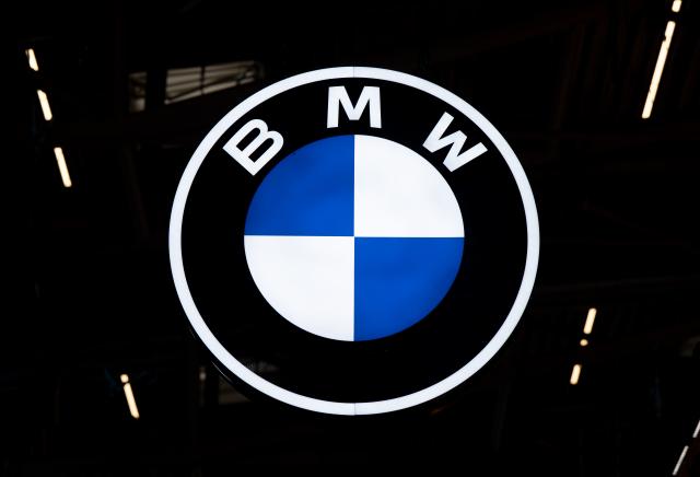 FILED - 10 September 2025, Bavaria, Munich: The BMW logo at the BMW booth during the International Motor Show (IAA Mobility). BMW is recalling hundreds of thousands of vehicles worldwide over a technical fault that could cause the cars to catch fire, the luxury carmaker said on Wednesday. Photo: Sven Hoppe/dpa