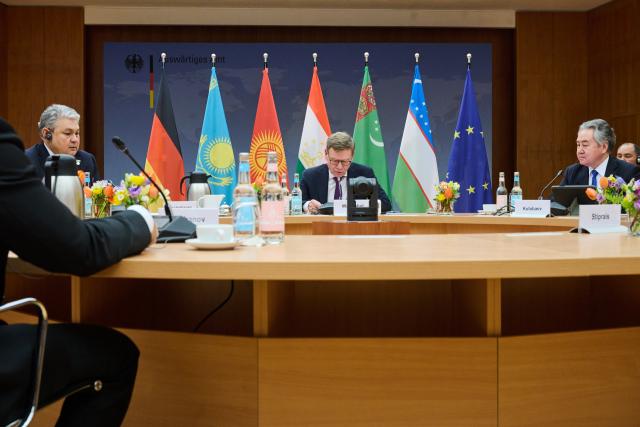 11 February 2026, Berlin: Germany's Foreign Minister Johann Wadephul (C) sits down for talks with his Central Asian counterparts at the Foreign Office. On his right is Kyrgyzstan's Foreign Minister Scheenbek Kulubajew, and on his left is Kazakhstan's Foreign Minister Jermek Koscherbajew. Photo: Annette Riedl/dpa