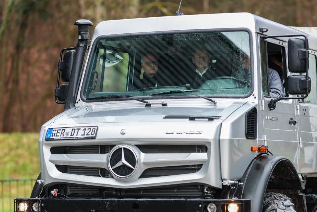 11 February 2026, Baden-Wuerttemberg, Gaggenau: Social Democratic Party of Germany (SPD) state election frontrunner Andreas Stoch (L) and former German Chancellor Olaf Scholz sit in a Unimog at the Unimog Museum ahead of the SPD Baden-Württemberg's state election campaign. Photo: Christoph Schmidt/dpa