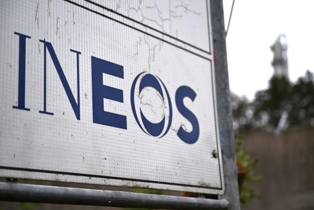 FILED - 06 October 2025, North Rhine-Westphalia, Cologne: The logo of the British chemicals group Ineos can be seen at the entrance to the company's site on the outskirts of Cologne, with an Ineos production plant in the background. Photo: Wolf von Dewitz/dpa
