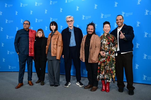 12 February 2026, Berlin: Members of the Berlinale jury (L-R) Shivendra Singh Dungarpur, Ewa Puszczynska, Bae Doona, Wim Wenders, president of the Berlinale jury, Min Bahadur Bham, Hikari, and Reinaldo Marcus Green, stand in the press center during the press call of the Berlinale International Jury on the opening day. The 76th Berlin International Film Festival will take place from February 12 to 22, 2026. Photo: Sebastian Christoph Gollnow/dpa