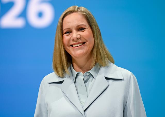 12 February 2026, Bavaria, Munich: Veronika Bienert, member of the Executive Board, stands on stage ahead of the Annual General Meeting. She will succeed Ralf P. Thomas as Chief Financial Officer on April 1, 2026. Photo: Sven Hoppe/dpa