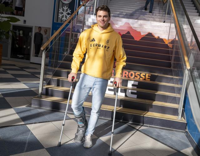 FILED - 19 January 2026, Bavaria, Munich: Alexander Schmid stands in the stairwell during the fitting for the Winter Games. German skier Alexander Schmid is fit to compete in the Olympic giant slalom on Saturday, the nation's ski federation DSV has said. Photo: Peter Kneffel/dpa