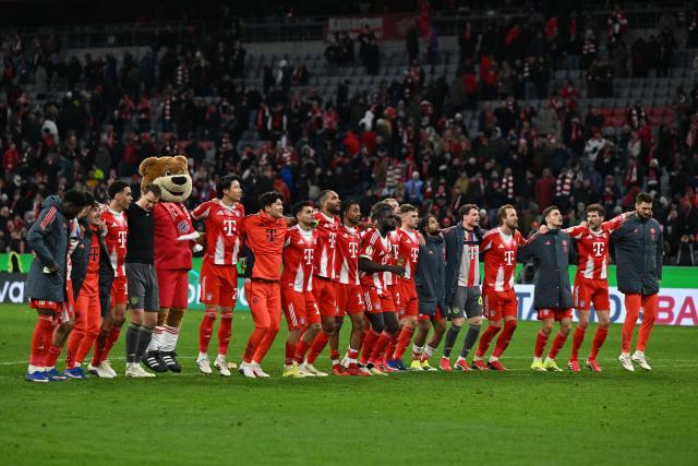 11 February 2026, Bavaria, Munich: Bayern Munich players celebrate after the German DFB Cup quarterfinal soccer match between Bayern Munich and RB Leipzig at the Allianz Arena. Photo: Sven Hoppe/dpa - WICHTIGER HINWEIS: Gemäß den Vorgaben der DFL Deutsche Fußball Liga bzw. des DFB Deutscher Fußball-Bund ist es untersagt, in dem Stadion und/oder vom Spiel angefertigte Fotoaufnahmen in Form von Sequenzbildern und/oder videoähnlichen Fotostrecken zu verwerten bzw. verwerten zu lassen.