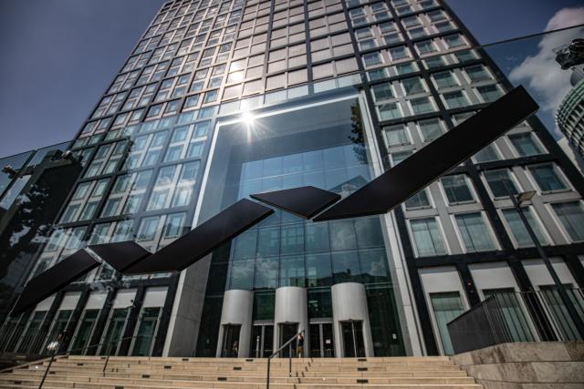 FILED - 27 August 2019, Hesse, Eschborn: The Deutsche Boerse Group logo can be seen on a glass wall in front of the company headquarters. Photo: Frank Rumpenhorst/dpa