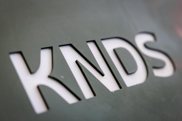 FILED - 24 February 2025, Bavaria, Nuremberg: The logo of the defense contractor KNDS can be seen at the company's booth at the Enforce Tac security technology trade fair. Photo: Daniel Karmann/dpa
