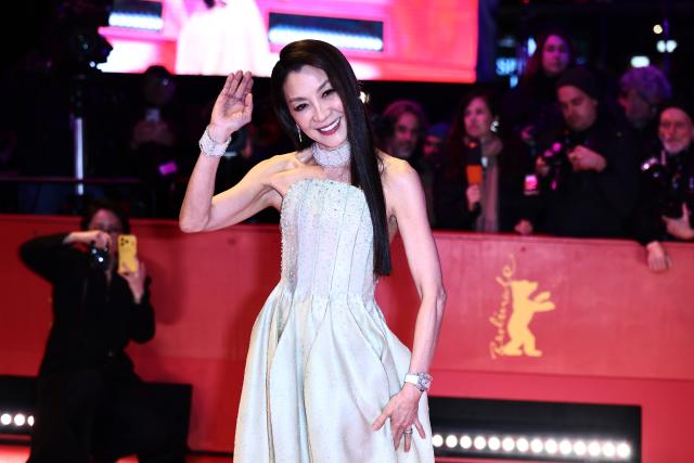 12 February 2026, Berlin: Malaysian actress Michelle Yeoh stands on the red carpet in front of the Berlinale Palast, on the opening night of the 76th Berlin International Film Festival. Photo: Christoph Soeder/dpa