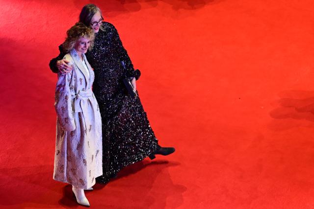 12 February 2026, Berlin: Berlinale director Tricia Tuttle (L) and Donata Wenders stand on the red carpet in front of the Berlinale Palast, on the opening night of the 76th Berlin International Film Festival. Photo: Sebastian Christoph Gollnow/dpa