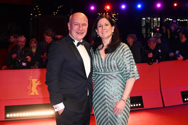 12 February 2026, Berlin: Berlin's Governing Mayor Kai Wegner (L) and Berlin's Senator for Education, Youth, and Family Affairs, Katharina Guenther-Wuensch stand on the red carpet in front of the Berlinale Palast, on the opening night of the 76th Berlin International Film Festival. Photo: Britta Pedersen/dpa