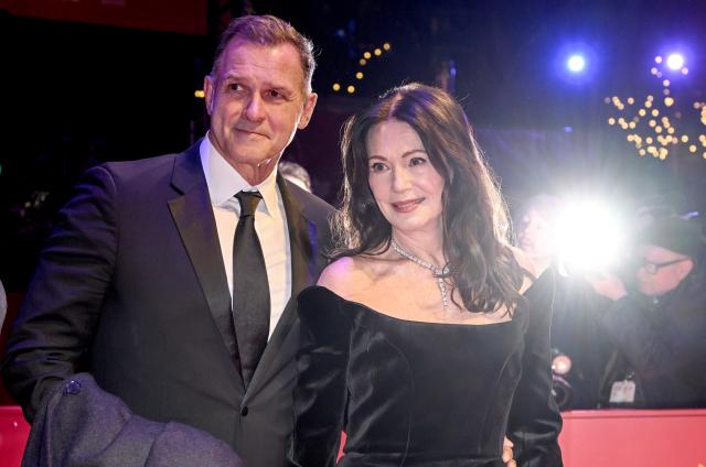 12 February 2026, Berlin: German actress Iris Berben and her partner Heiko Kiesow stand on the red carpet in front of the Berlinale Palast, on the opening night of the 76th Berlin International Film Festival. Photo: Britta Pedersen/dpa