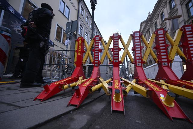 13 February 2026, Bavaria, Munich: Barriers are set up in front of the Bayerischer Hof hotel ahead of the 62nd Munich Security Conference, which is expected to host more than 60 heads of state and government-the highest number ever at the world's leading security policy forum. Photo: Felix Hörhager/dpa