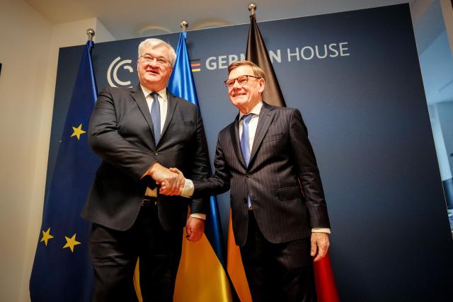 13 February 2026, Bavaria, Munich: Johann Wadephul (R), Germany's Foreign Minister, welcomes Andrij Sybiha, Ukraine's Foreign Minister, to the 62nd Munich Security Conference (MSC). Photo: Kay Nietfeld/dpa