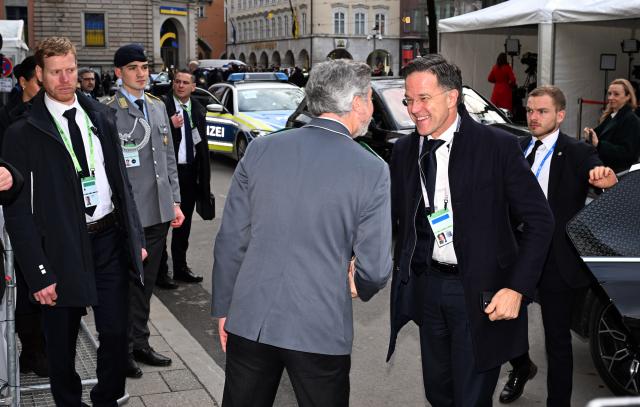 13 February 2026, Bavaria, Munich: NATO Secretary General Mark Rutte (Center R) arrives at the Bavarian Hof for the 62nd Munich Security Conference. Photo: Felix Hörhager/dpa