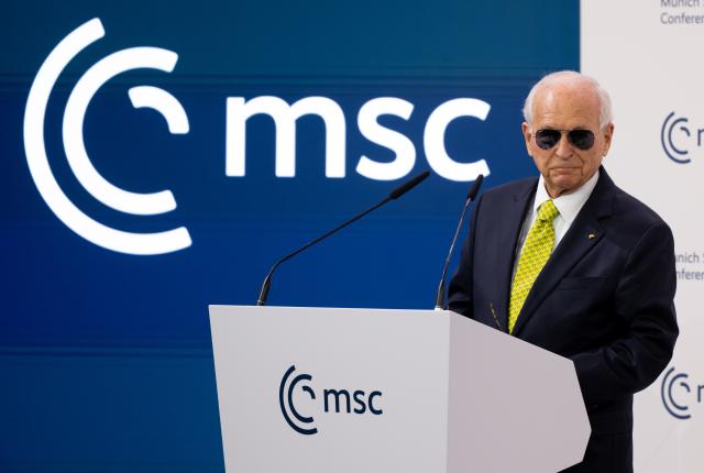 13 February 2026, Bavaria, Munich: Wolfgang Friedrich Ischinger, Chairman of the Munich Security Conference, wears sunglasses as he speaks during the opening of the 62nd Munich Security Conference at the Bayerischer Hof Hotel. Photo: Sven Hoppe/dpa