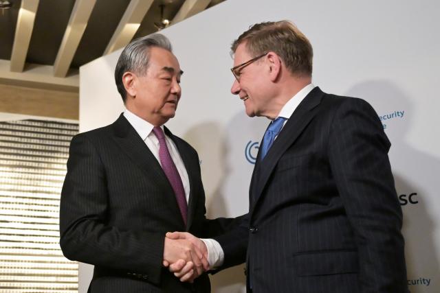 13 February 2026, Bavaria, Munich: German Foreign Minister Johann Wadephul (R) and Wang Yi, Foreign Minister of China, meet for talks on the sidelines of the 62nd Munich Security Conference at the Bayerischer Hof Hotel. Photo: Malin Wunderlich/dpa