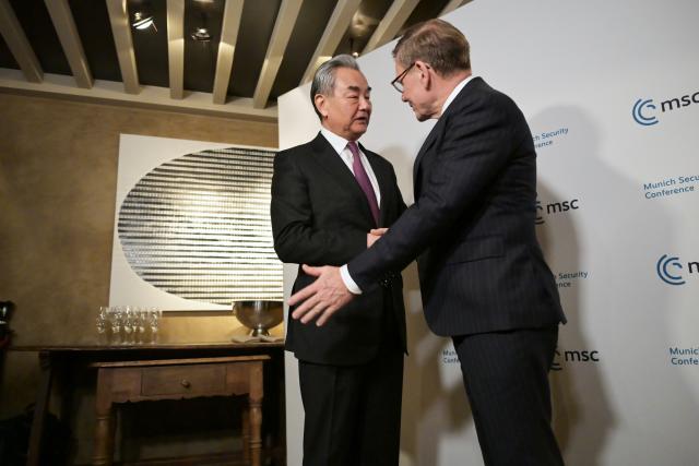 13 February 2026, Bavaria, Munich: German Foreign Minister Johann Wadephul (R) and Wang Yi, Foreign Minister of China, meet for talks on the sidelines of the 62nd Munich Security Conference at the Bayerischer Hof Hotel. Photo: Malin Wunderlich/dpa