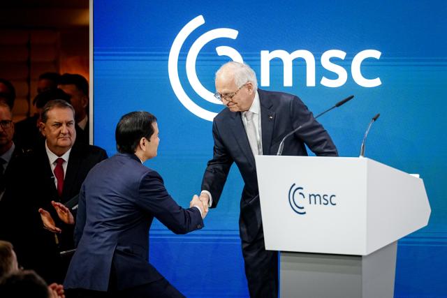 14 February 2026, Bavaria, Munich: Wolfgang Ischinger (R), Chairman of the Munich Security Conference, welcomes US Secretary of State Marco Rubio at the 62nd Munich Security Conference. Photo: Kay Nietfeld/dpa