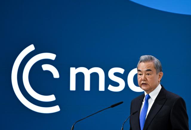 14 February 2026, Bavaria, Munich: Chinese Foreign Minister Wang Yi speaks at the 62nd Munich Security Conference. Photo: Kay Nietfeld/dpa