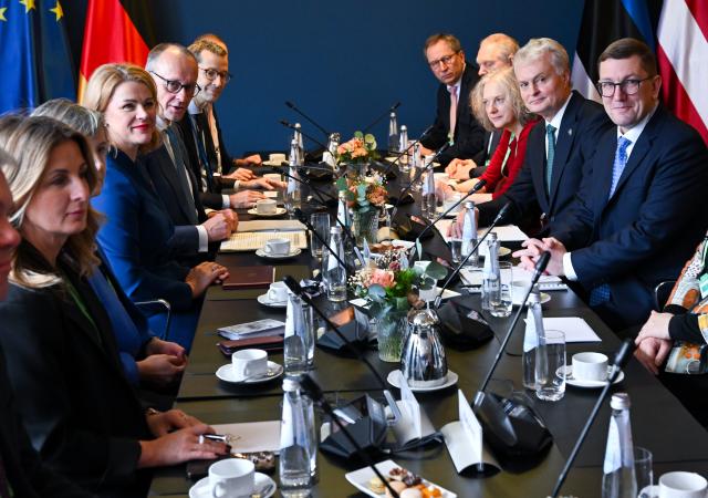 14 February 2026, Bavaria, Munich: Kristen Michal, Estonia's Prime Minister, Gitanas Nauseda, Lithuania's President, German Chancellor Friedrich Merz, Evika Silina, Latvia's Prime Minister, and members of the delegations meet for talks at the 62nd Munich Security Conference. Photo: Sven Hoppe/dpa-Pool/dpa