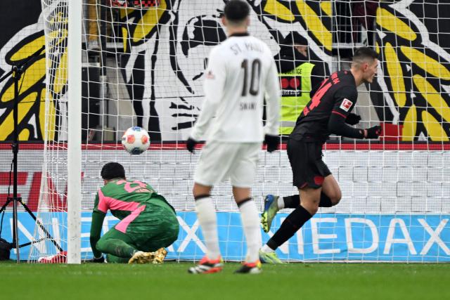 14 February 2026, North Rhine-Westphalia, Leverkusen: Leverkusen's Patrick Schick scores his side's second goal during the German Bundesliga soccer match between Bayer Leverkusen and FC St. Pauli at BayArena. Photo: Federico Gambarini/dpa - IMPORTANT NOTE: In accordance with the regulations of the DFL German Football League and the DFB German Football Association, it is prohibited to utilize or have utilized photographs taken in the stadium and/or of the match in the form of sequential images and/or video-like photo series.