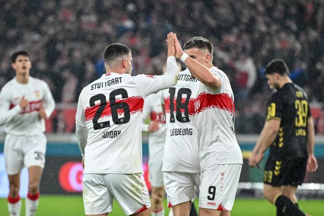 14 February 2026, Baden-Württemberg, Stuttgart: Stuttgart's Ermedin Demirovic celebrates scoring his side's first goal during the German Bundesliga soccer match between VfB Stuttgart and 1. FC Cologne at MHPArena. Photo: Harry Langer/dpa - IMPORTANT NOTE: In accordance with the regulations of the DFL German Football League and the DFB German Football Association, it is prohibited to utilize or have utilized photographs taken in the stadium and/or of the match in the form of sequential images and/or video-like photo series.