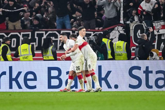14 February 2026, Baden-Württemberg, Stuttgart: Stuttgart's  Deniz Undav celebrates scoring his side's third goal during the German Bundesliga soccer match between VfB Stuttgart and 1. FC Cologne at MHPArena. Photo: Harry Langer/dpa - IMPORTANT NOTE: In accordance with the regulations of the DFL German Football League and the DFB German Football Association, it is prohibited to utilize or have utilized photographs taken in the stadium and/or of the match in the form of sequential images and/or video-like photo series.