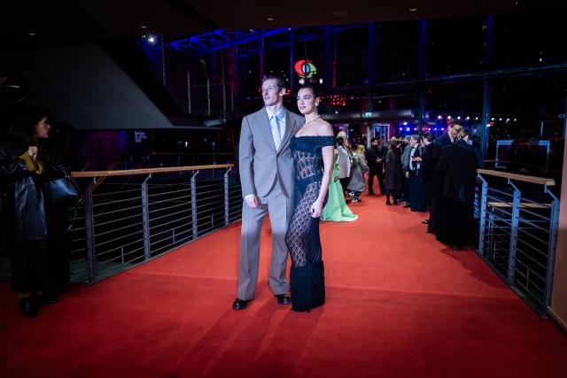 14 February 2026, Berlin: English Singer Dua Lipa and English actor Callum Turner walk the red carpet at the premiere of the film "Rosebush Pruning" during the 76th Berlin International Film Festival. Photo: Christoph Soeder/dpa